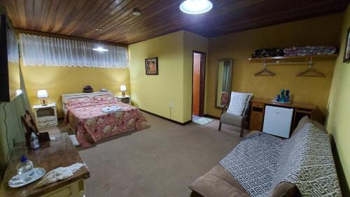 Teresopolis Apartment | Suíte com vista da Serra