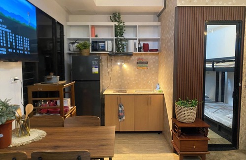 Digos City Apartment | Summers Cozy studio in delightful Digos City with AC