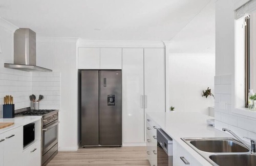 Bateau Bay House | Sun Drenched Home Away from Home/ Bateau Bay