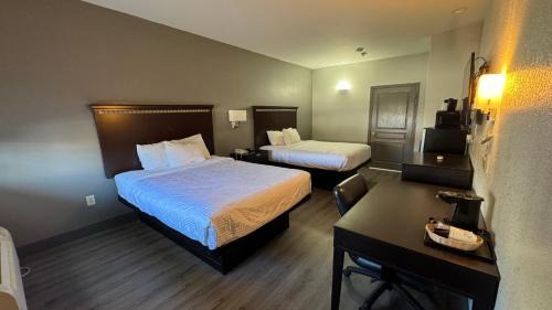 Pleasanton Hotel | Sunbridge Inn & Suite Extended Stay