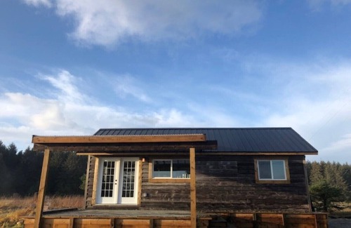 Sandspit House | Sunrise Cabin Private Beach Front Accommodation
