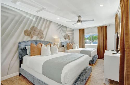 Garden Isles House | Sunset Oasis with Movie Theatre, Heated Pool & Game Room