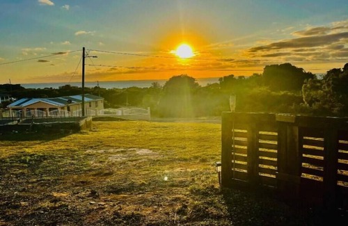 Frederiksted Southeast RV Rental | Sunset Villas"Tecoma Stans" Glamping Tent Walking Distance to the Beach