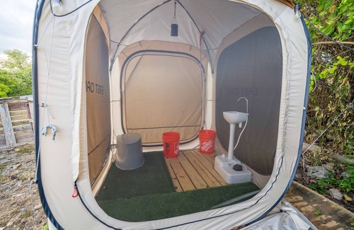 Frederiksted Southeast RV Rental | Sunset Villas"Tecoma Stans" Glamping Tent Walking Distance to the Beach