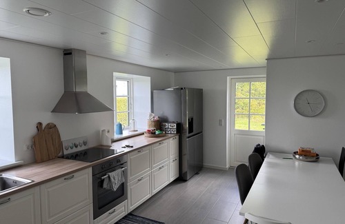 Rodby House | Super charming holiday home with space for 10 people and a huge plot.