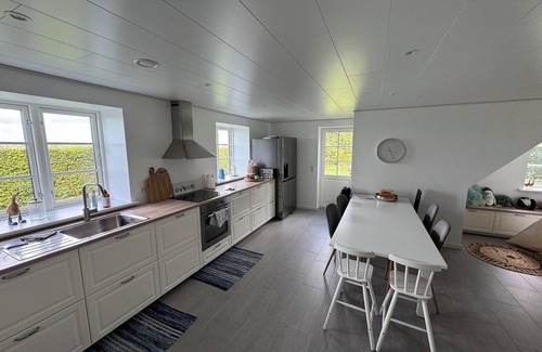 Rodby House | Super charming holiday home with space for 10 people and a huge plot.