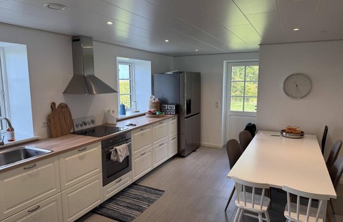 Rodby House | Super charming holiday home with space for 10 people and a huge plot.