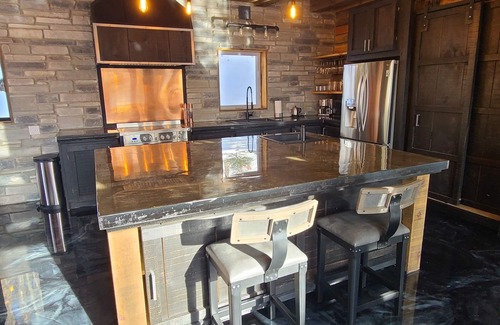 Wentworth-Nord Ski Chalet | Superb luxury chalet lost in the forest, with spa, fireplace and lake view!