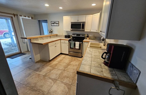 Swain Apartment | Swain Hill Hideaway offers beautiful ski area view. Accommodates 4 guests.