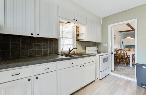 Russellville House | Swimmin’ Hole 2 - lakefront getaway with back porch living, dock & boat launch