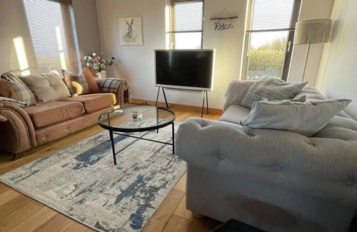 Stromness House | Switha- 3 bed home in Orkney, Scotland with hot tub and outstanding sea views