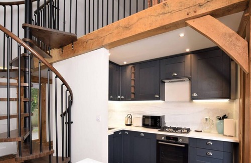 Woodmancote House | The Barn at Pigeon Cottage