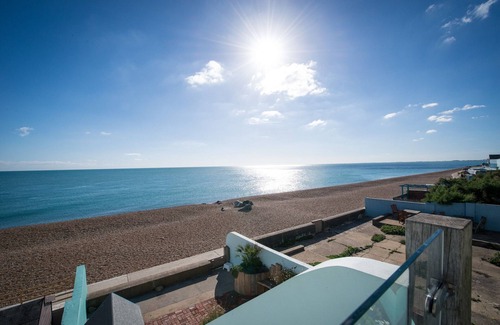 Sandgate House | The Beach House at Sandgate Right on the beach