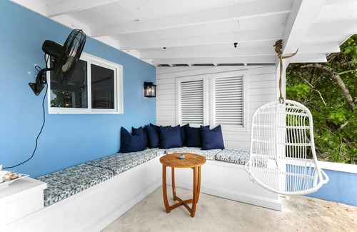 Dunmore Town House | The Blue Bungalow: A charming cottage set above the water in Harbour Island