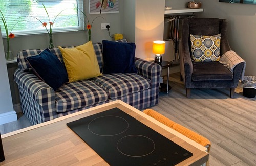 Winterbourne Cabin | The Cabana ideal home to play & stay. Private Hot Tun and garden