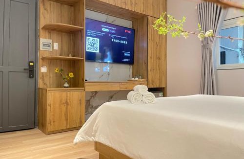 Nguyen Hue Walking Street Apartment | The Cafe Apartment building - 6even