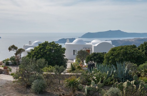 Santorini Villa | The Dome House: stunning sea views, garden, pond and squash court