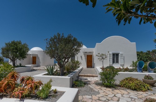 Santorini Villa | The Dome House: stunning sea views, garden, pond and squash court