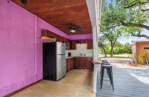 Driftwood Cabin | The Driftwoods - Charming Green Cabin with Fun Entertainment Area