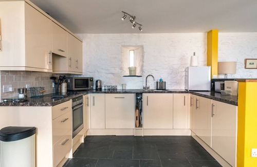 Tenby House | The Forge · St Davids Hideaway with Roll-top Bath & Log Burner