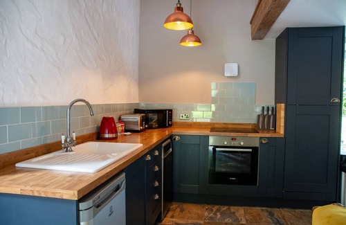 Bryngwran Cottage | The Hayloft - sleeps 2 guests in 1 bedroom