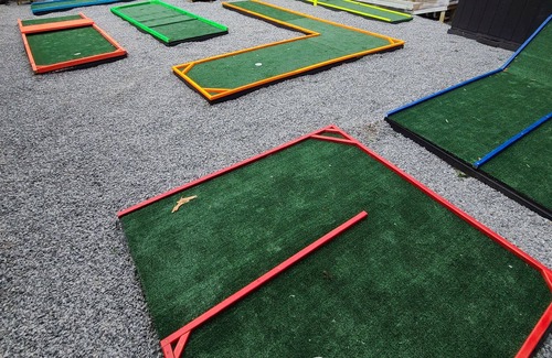 Columbus House | The Mini Golf Oasis king beds & Movie/Game room minutes to Fort Benning GA.