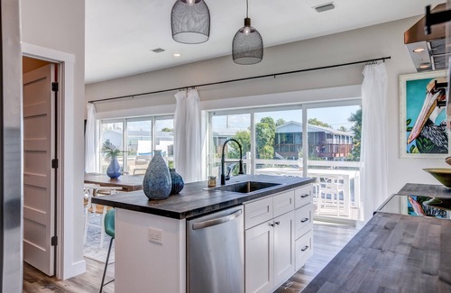 Cutthroat Harbor Estates House | The Salty Sailfish: Live the Keys Life, Stunning Canal Front Home, Pool, Dock & Dog-Friendly Bliss!