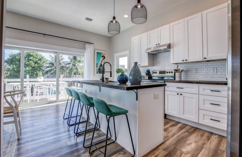 Cutthroat Harbor Estates House | The Salty Sailfish: Live the Keys Life, Stunning Canal Front Home, Pool, Dock & Dog-Friendly Bliss!