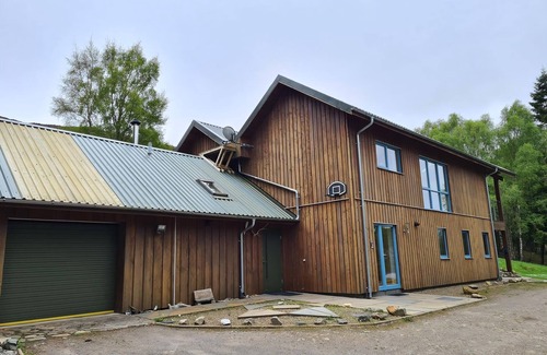 Muir of Ord Cottage | The setting up Strathconon with loch and hill views is truly spectacular.