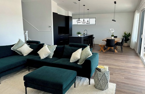 Moonee House | This stylish place to stay is perfect, elegantly finished with ample space.
