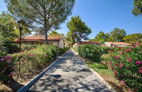 Piombino Apartment | THR-ISA-Appartament plus with mezzanine, 4 beds, air conditioning and private outdoor area in Village with 6 swimming-pools