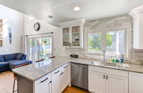 Mineral House | Three-story lakefront home w/covered boat slip, and tennis/pickleball access