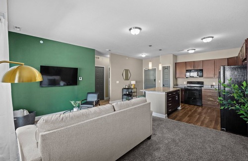 West Des Moines Apartment | Top Floor! Garage Included + New Onsite Gym!