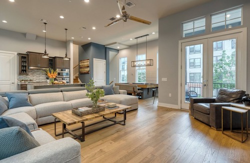 Riverside House | Town Lake Townhouse | Hot Tub, Game Room & Skyline Views