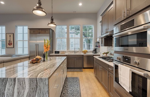 Riverside House | Town Lake Townhouse | Hot Tub, Game Room & Skyline Views