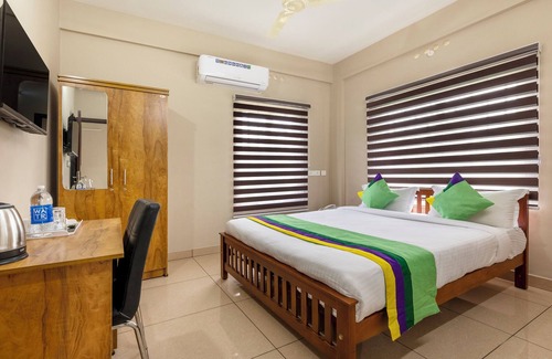 Alwaye Hotel | Treebo Dreams Arcade