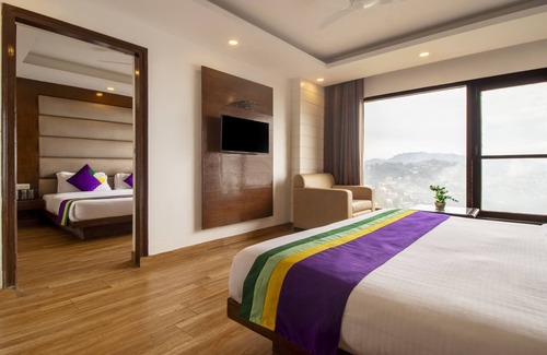 The Mall Road Hotel | Treebo Premium Queen Of Hills Near Mall Road