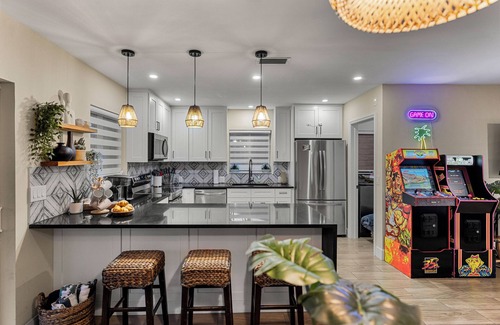 Edgewood House | Tropical Getaway + Heated Pool, Arcades–5 MIN to The Fort: Pickleball - Sleeps 8