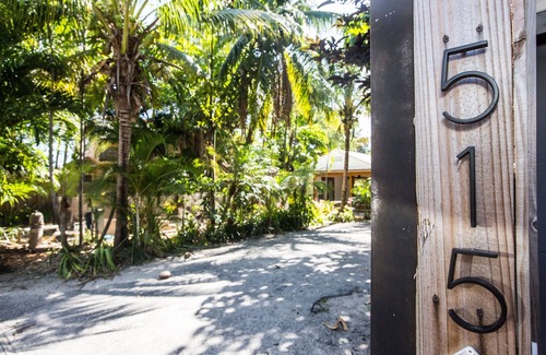 Mango Groves Cottage | Tropical Heated Pool home in fun beach side town Sleeps 8 Private