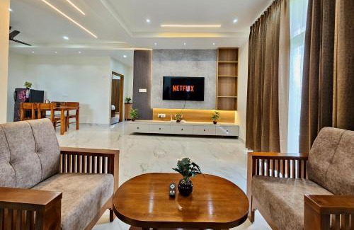 Tirupati Apartment | TrueLife Summit Suites - Premium stay near Tirupati temples - Breakfast included - Spacious AC apartments with in suite bathrooms - 55" Android TV, 250 Airtel channels, Super fast WiFi - Hall, Modular kitchen, Dining, RO system, Parking - Top service