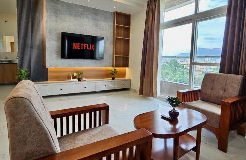Tirupati Apartment | TrueLife Summit Suites - Premium stay near Tirupati temples - Breakfast included - Spacious AC apartments with in suite bathrooms - 55" Android TV, 250 Airtel channels, Super fast WiFi - Hall, Modular kitchen, Dining, RO system, Parking - Top service