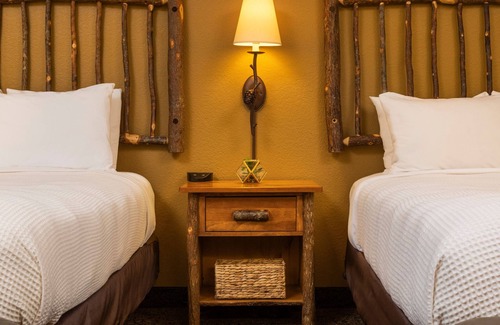 Rothschild Hotel | Two Queen Fireplace Suite With Kitchen, Access to Pool, Hot Tub, and Gym