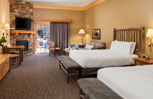 Rothschild Hotel | Two Queen Fireplace Suite With Kitchen, Access to Pool, Hot Tub, and Gym