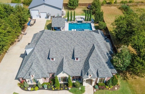 Owasso House | Ultimate Luxury Retreat: House Boasts Hot Tub, Pool, and Easy Airport Access