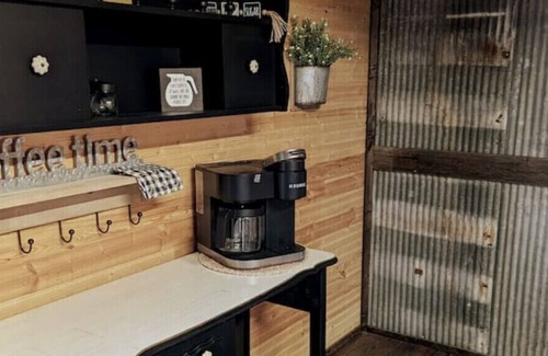 Jasonville RV Rental | Unique 14x40 Cozy cabin with large front Deck That overlooks the water.