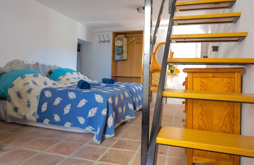 Competa House | Unique stay in a restored olive mill museum.
