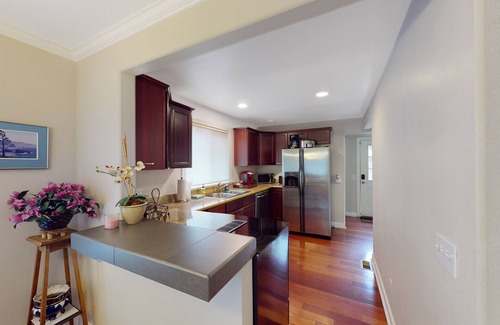 Columbia City House | Updated home 2 blocks from the light rail with hot tub, firepit & lovely patio