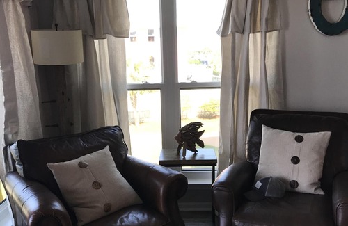 Sunnyside Condo | Updated, spacious Gulf-front Condo- just steps to the beach!