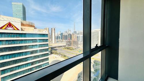 Business Bay House | Upscale Apartment at Oval Tower Near Downtown with Balcony and Parking by Belvilla