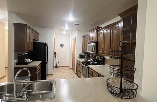 Spiro House | Upscale home with high end furnishings and memory foam king bed. 2 car garage